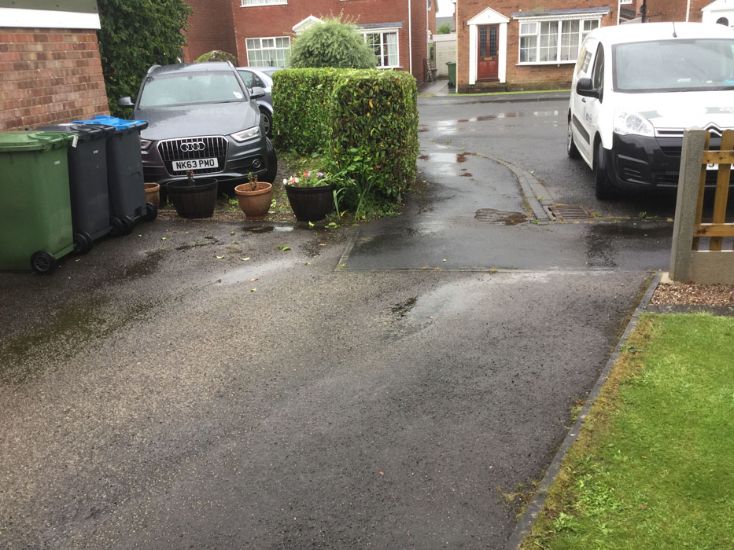 Before image of a concrete driveway in York